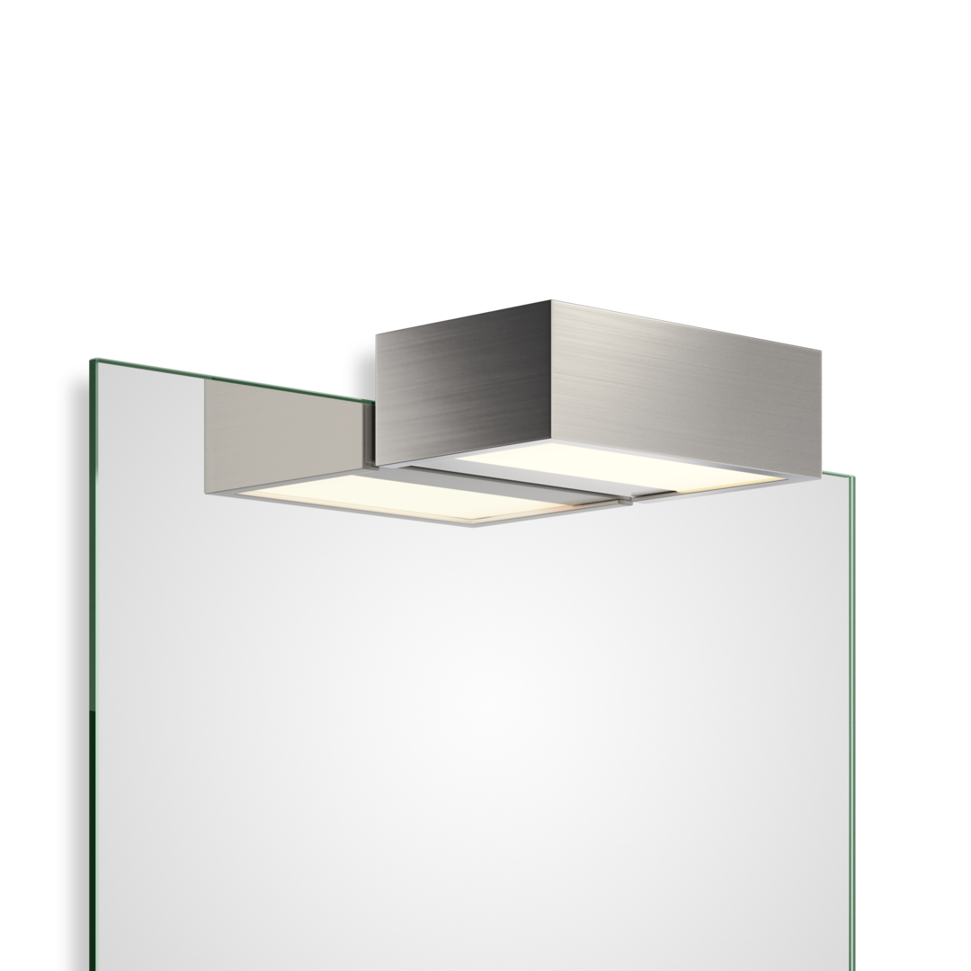 Die elegante Decor Walther Box 15 Spiegellampe in Nickel Satiniert bei dasfeinebad – ideal für eine klare und definierte Lichtqualität im Badezimmer.