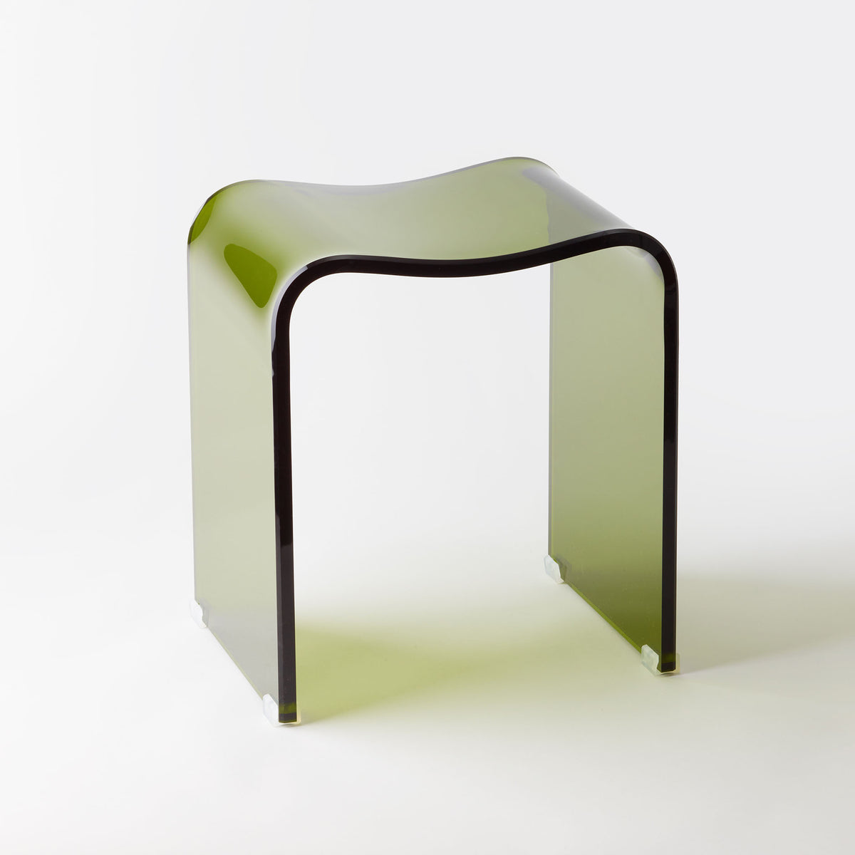 Decor Walther DW2000 Badhocker aus transparentem Acryl in Olive mit lichtdurchlässigem Design und geschwungener, wasserähnlicher Formgebung