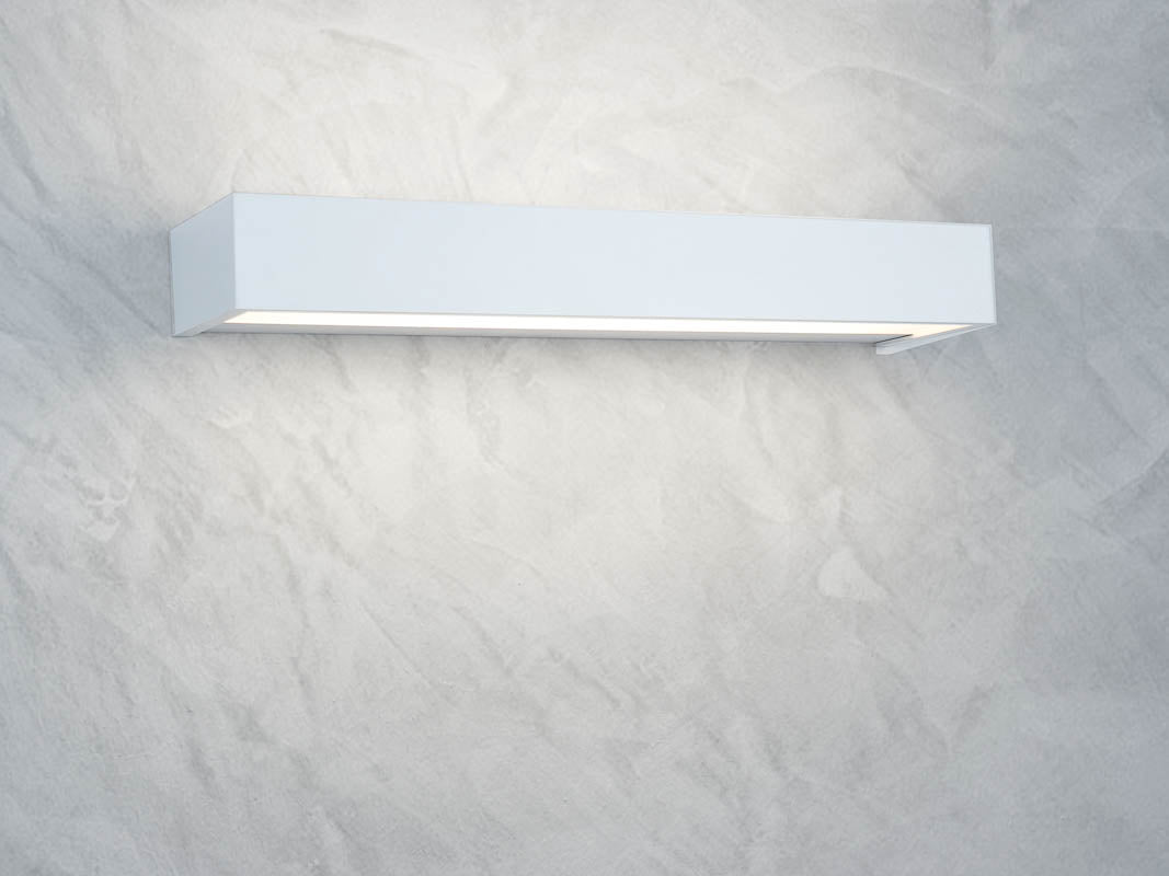 Die elegante Decor Walther Box 40 Badleuchte in Weiß matt, erhältlich bei dasfeinebad, verleiht Ihrem Badezimmer eine ruhige Atmosphäre.