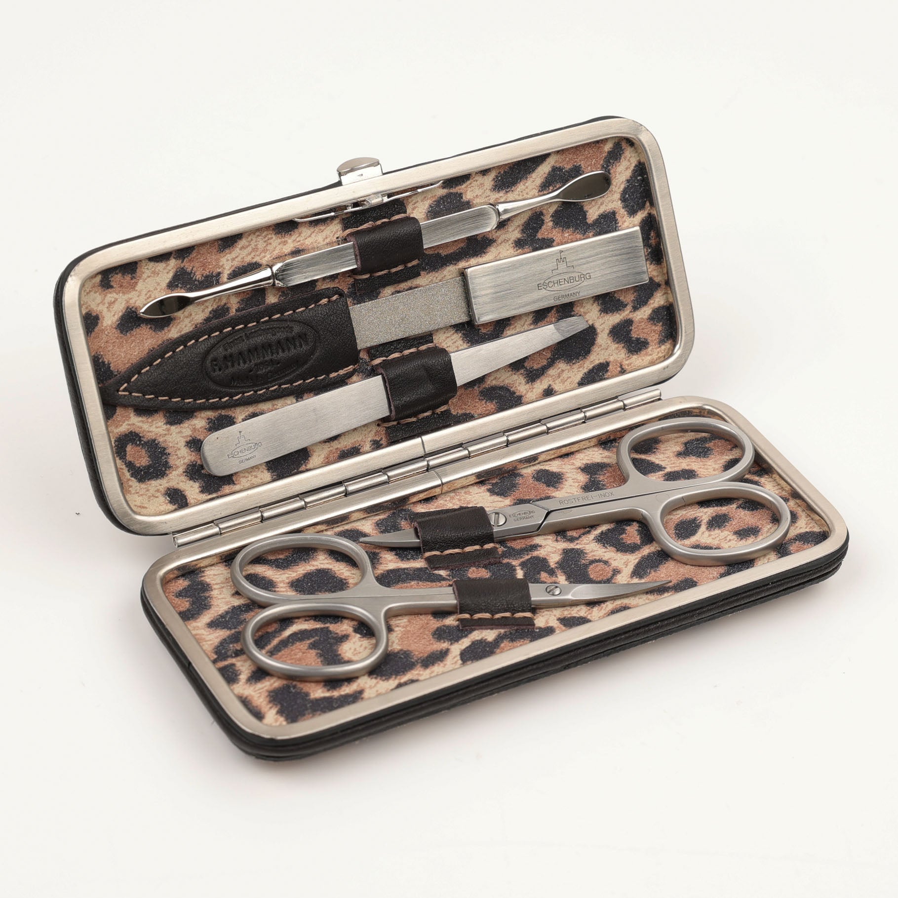 Edles Lederetui Leopard mit Maniküre-Set – kompakter Begleiter aus feinstem Kalbsleder mit Nagel- und Hautscheren, Pinzette, Feile und Nagelhautschieber.