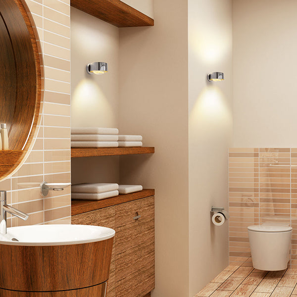 PUK Maxx Wall Leuchte in glänzendem Chrom, elegantes rundes Design, warmweiße LED-Beleuchtung, anpassbare Lichtausrichtung